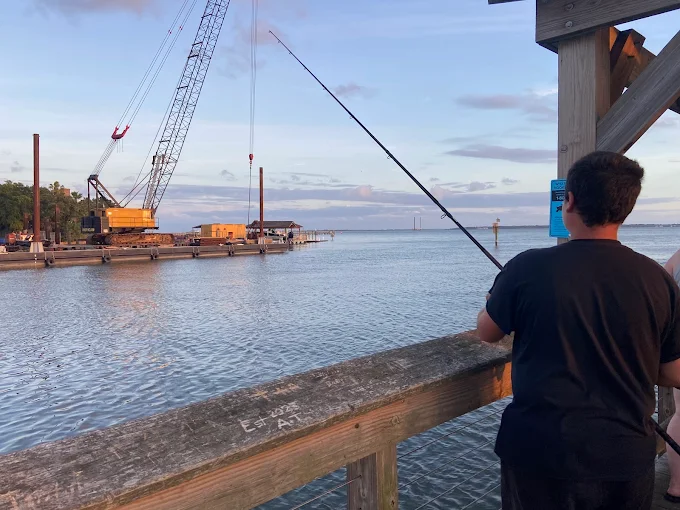 A man fishing relies on fishing rod and reel rental Charleston provided by Charleston Fishing Rentals in Isle of Palms, South Carolina.