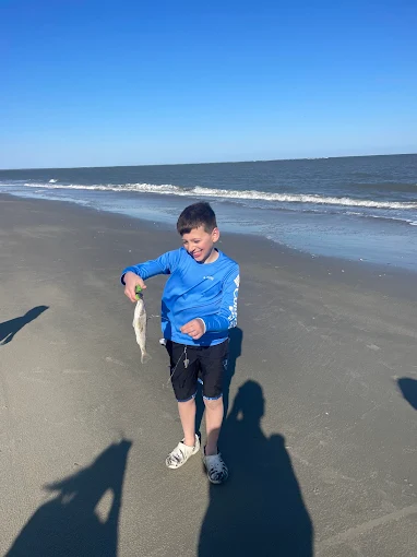 Running along the beach reflects outings supported by beach fishing equipment rental Charleston from Charleston Fishing Rentals.