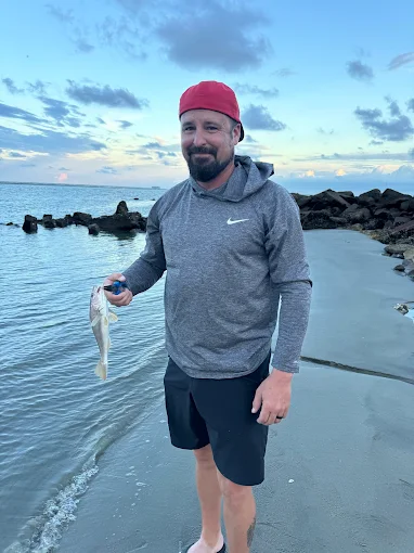 A beach catch is held using fishing tackle rental Charleston SC from Charleston Fishing Rentals.